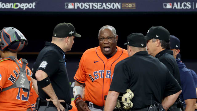 Oct 20, 2023; Arlington, Texas, USA; Houston Astros manager Dusty Baker (12) argues with umpires after Texas Rangers right fielder Adolis Garcia (not pictured) was hit by a pitch and Astros pitcher Bryan Abreu (not pictured) was ejected during the eighth inning of game five in the ALCS for the 2023 MLB playoffs at Globe Life Field. Mandatory Credit: Kevin Jairaj-USA TODAY Sports